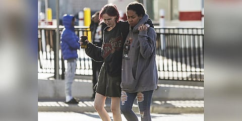People are seen at the scene of a shooting on the University of Nevada, Las Vegas, campus on Wednesday, Dec. 6, 2023, in Las Vegas. (Photo | AP)