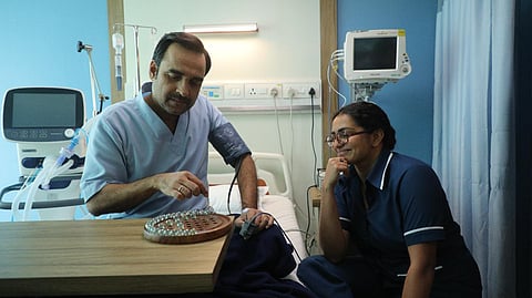 A still from ‘Kadak Singh’, featuring Pankaj Tripathi and Parvathy Thiruvothu.