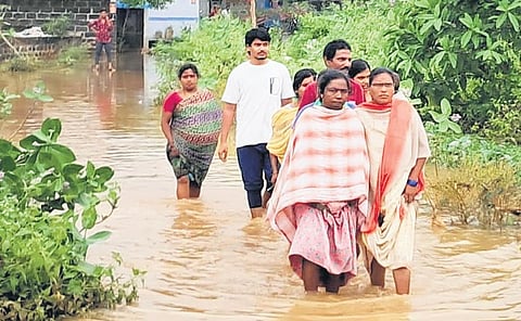 Roads in Aswaraopet village in Khammam district resembled rivulets on Wednesday following heavy rains induced by Cyclone Michaung that made landfall on Tuesday.