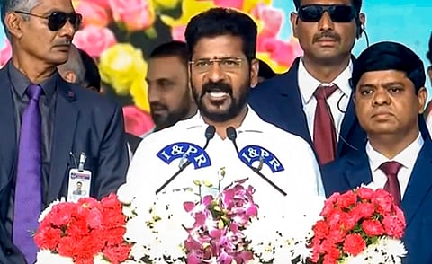 Congress leader Revanth Reddy takes oath as Telangana Chief Minister administered by the state Governor Tamilisai Soundararajan, in Hyderabad on Thursday. (Photo | PTI)