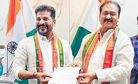 Congress leader Md Shabbir Ali with A Revanth Reddy.