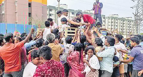 Residents crowd to receive relief materials from volunteers | Express