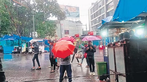 Rain in Rourkela kept people confined to homes while a few were seen moving out on the streets on Thursday | Express