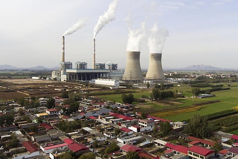 FILE - Guohua Power Station, a coal-fired power plant, operates in Dingzhou, Baoding, in the northern China's Hebei province, Friday, Nov. 10, 2023. (AP Photo)