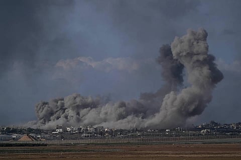 Smoke rises from the Gaza Strip after Israeli strikes on Saturday, December 9, 2023. (AP)
