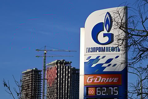 A view of a petrol station of the Russian oil producer Gazprom Neft and high-rise residential buildings under construction in Moscow on January 12, 2023. (Photo | AFP)
