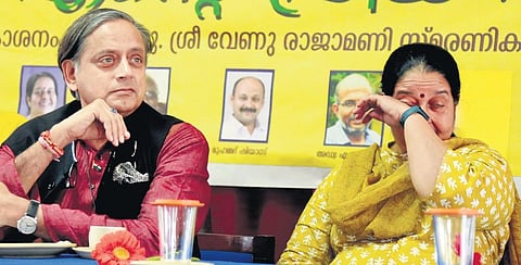 MLA Uma Thomas tears up during the rending of the song ‘Chandra Kalabham’ at the meeting to commemorate the late Congress leader P T Thomas, in Kochi on Saturday. MP Shashi Tharoor is also seen | T P