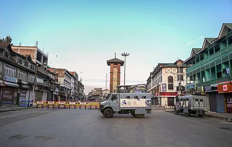 A file photo of CRPF vehicles stationed at the Lal Chowk in Srinagar. (Photo | PTI)