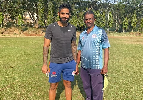 Suryakumar Yadav with coach Ashok Aswalkar