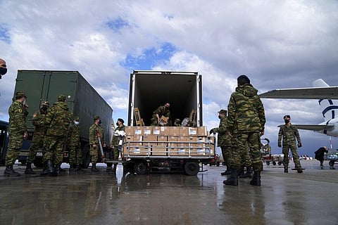Greek soldiers prepare a plane loaded with humanitarian aid at Eleftherios Venizelos International Airport in Athens, Feb. 27, 2022. (File Photo | AP)