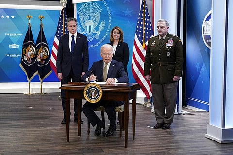 US President Joe Biden is flanked by from L to R) Secy of State Antony Blinken, Dy Secy of Defence Kathleen Hicks and Chairman of the Joint Chiefs of Staff General Mark Milley. (File Photo | AP)