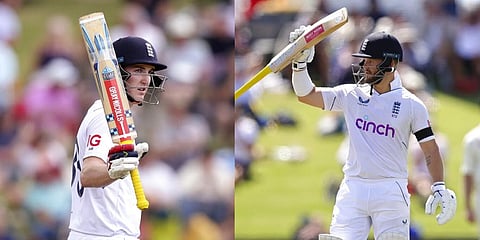 England's Harry Brook (L) and Ben Duckett raise their bats after scoring a half-century on day one of the first Test against New Zealand in Tauranga, Feb. 16, 2023. (Photo | AP)
