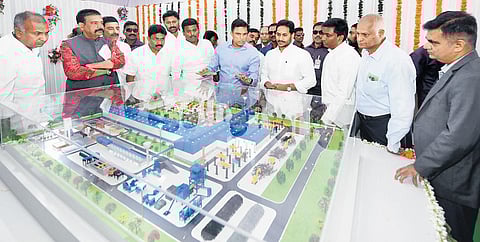 CM Jagan and JSW Group CMD Sajjan Jindal looking at a prototype of the Kadapa Steel Plant after performing Bhoomi Puja at Sunnapurallapalle village I Express