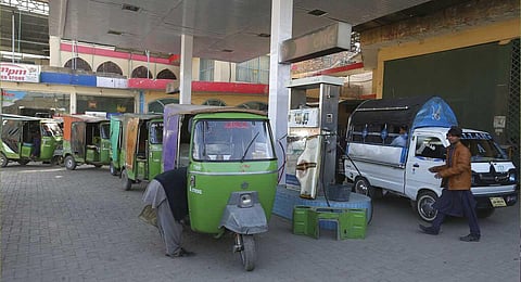 People wait their turn for filling gas into their vehicles gas at a CNG station, in Peshawar, Pakistan, Tuesday, Feb. 14, 2023. (Photo | AP)