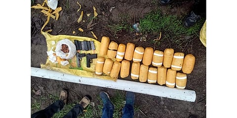 Arms, ammunition and narcotics recovered by BSF during a search operation after gunfight with smugglers near the India-Pakistan border, in Punjab, Saturday, Feb. 18, 2023. (Photo | PTI)