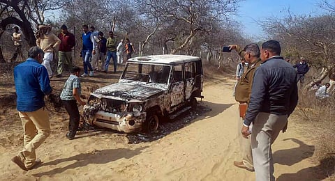 Charred remains of a vehicle where bodies of two Muslim men were found, at Loharu in Bhiwani district, Haryana. Nasir and Junaid alias 'Juna. (Photo | PTI)