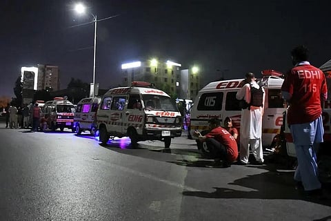 Ambulances are parked close to the incident site following gunmen attack on police headquarters, in Karachi, Pakistan, Friday, Feb. 17, 2023. (Photo | AP)