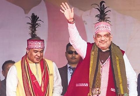 Amit Shah at a public rally ahead of Meghalaya Assembly elections at Dalu in West Garo Hills district on Friday. Assam CM Himanta Biswa Sarma is also seen. (Photo | PTI)