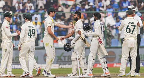 Indian and Australian players greet each other after the end of the 2nd test cricket match between India and Australia, at the Arun Jaitley Stadium, Feb. 19, 2023. (Photo | PTI)