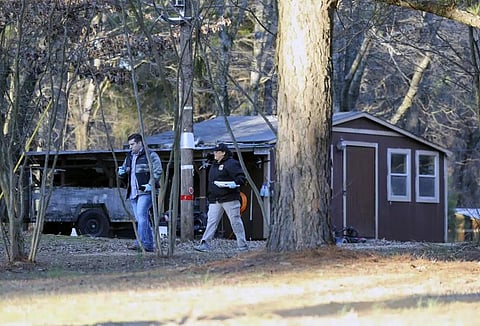 Law enforcement personnel investigate the scene of multiple shootings on Arkabutla Dam Road in Arkabutla, Miss on Friday, Feb. 17, 2023. (Photo | AP)