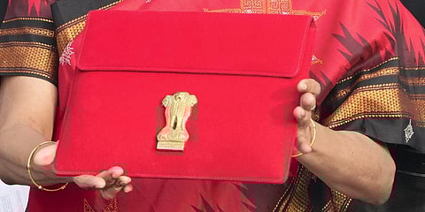 Union Finance Minister Nirmala Sitharaman holds a folder-case containing Union Budget 2023-24 outside the Finance Ministry. (Photo | PTI)