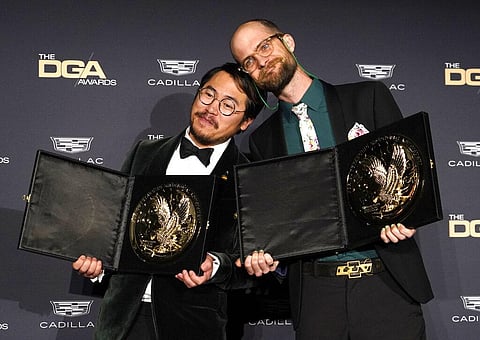 Daniel Kwan, left, and Daniel Scheinert with the award for outstanding directorial achievement for 'Everything Everywhere All at Once' at the DGA Awards. (Photo | AP)