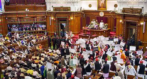 Samajwadi Party leaders protest as Uttar Pradesh Governor Anandiben Patel addresses the joint sitting of both Houses of the state during the Budget Session of Uttar Pradesh Assembly. (Photo | PTI)
