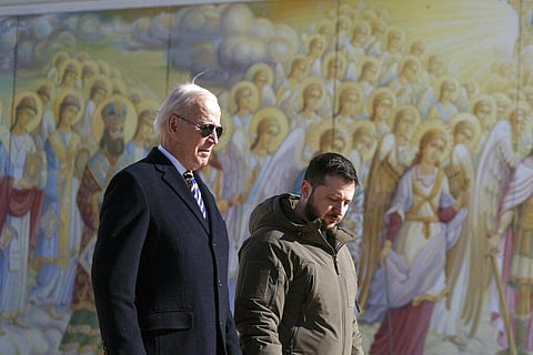 US President Joe Biden (L) walks with Ukrainian President Volodymyr Zelenskyy at St. Michaels Golden-Domed Cathedral in Kyiv, Ukraine, Monday, Feb. 20, 2023. (Photo | AP)