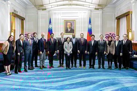 Taiwan's President Tsai Ing-wen (C) and Taiwanese officials pose for photos with a U.S. delegation during a meeting at the Presidential Office in Taipei, Feb. 21, 2023. (Photo | AP)