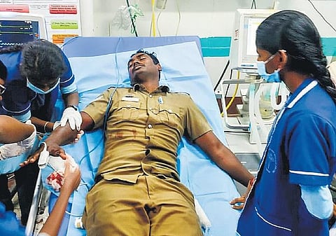 One of the injured policemen being treated at Tiruchy GH on Monday | Express