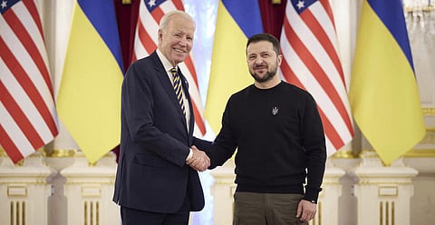 Zelenskyy, right, and Joe Biden shake hands during their meeting in Kyiv, Ukraine on Monday, Feb. 20, 2023. (Ukrainian Presidential Press Office via AP)