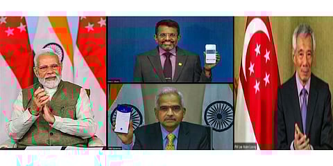 PM Narendra Modi and Singapore PM Lee Hsien Loong witness the launch of UPI-PayNow linkage via video conferencing, Feb. 21, 2023. (Photo | PTI)