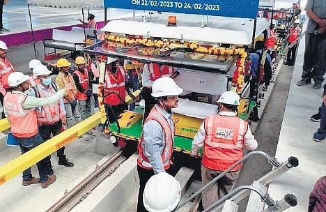 BMRCL officials and staff inspect a section of the 13.71-km stretch from Whitefield to K R Puram on the extended Purple Line stretch, in Bengaluru on Wednesday