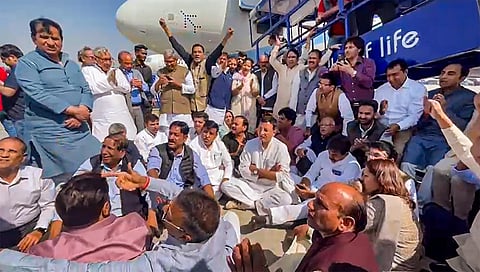 Congress leaders stage a protest at the IGI Airport after Pawan Khera was allegedly deboarded from the plane in New Delhi, Thursday, Feb. 23, 2023. (Photo | PTI)