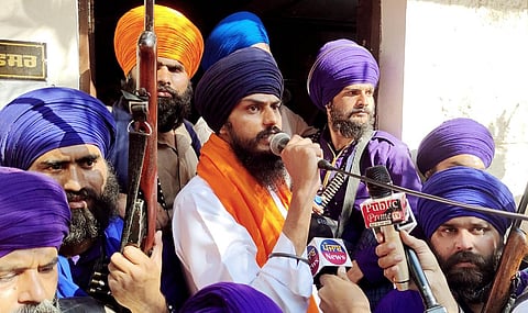 Waris Punjab De' chief Amritpal Singh speaks to media after his supporters forcibly enter a police station demanding the release of Singh's close aide, in Ajnala near Amritsar. (Photo | ANI)