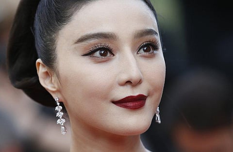 In this May 24, 2017, file photo, Fan Bingbing poses for photographers as she arrives for the screening of the film The Beguiled at the 70th international film festival, Cannes. (File Photo | AP)