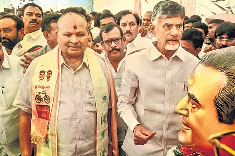 Former State BJP president Kanna Lakshminarayana with TDP chief Chandrababu Naidu at the party headquarters in Mangalagiri on Thursday I Prasant Madugula