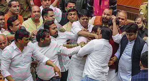 Councillors of AAP and BJP clash during the election of members of the MCD Standing Committee, at the Civic Centre in New Delhi. (Photo | PTI)