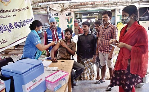 A healthcare worker administers the Covid-19 vaccine to a man in Chennai. (File Photo | P Jawahar, EPS)