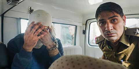 Aaftab Amin Poonawala, accused to have murdered his live-in partner Shraddha Walkar, being brought to the Mehrauli forest area. (File Photo | PTI)