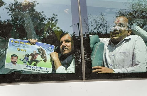 AAP MP Sanjay Singh after being detained during a protest against the CBI's questioning of Delhi Deputy Chief Minister Manish Sisodia in the liquor policy case, in New Delhi. (Photo | PTI)