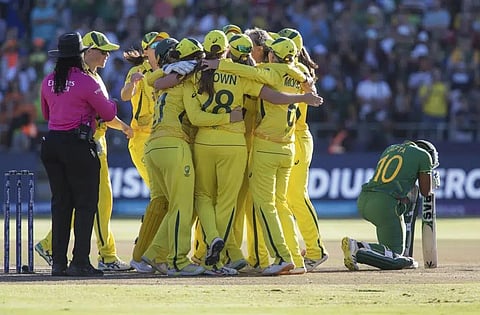 Australia players celebrate winning against South Africa in the Women's T20 World Cup final cricket match in Cape Town, South Africa, Feb. 26, 2023. (File Photo | AP)