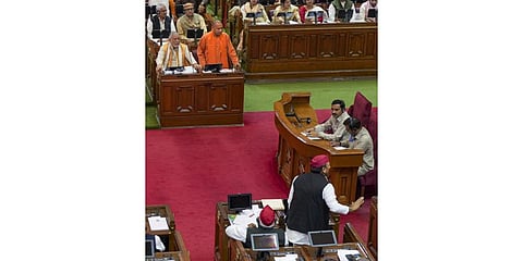 UP CM Yogi Adityanath and Samajwadi Party President & MLA Akhilesh Yadav during the Budget Session of UP Assembly, in Lucknow, Feb. 25, 2023. (Photo | PTI)