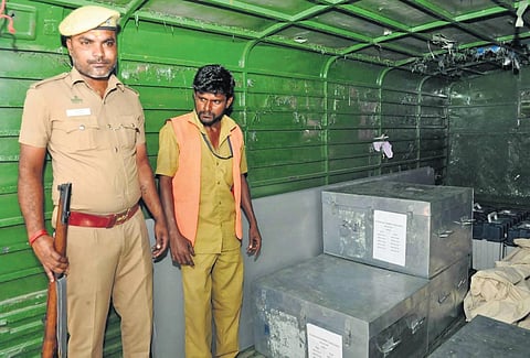 EVMs were dispatched to all the 238 polling booths from Erode Corporation Office campus on Sunday | Express