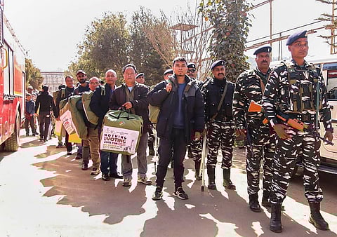 Polling team accompanied by security personnel ready to leave dispatch centres ahead of Meghalaya Assembly elections, in East Khasi Hills, Feb. 26, 2023. (Photo | PTI)