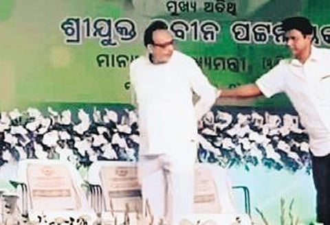 Video grab of Bobby Das pulling Rabi Nanda away from the stage | Express