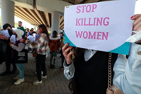Iraqi women's rights activists during a rally in Baghdad on February 5, 2023, to protest the killing of Iraqi youtuber Tiba al-Ali by her father. (Photo | AFP)