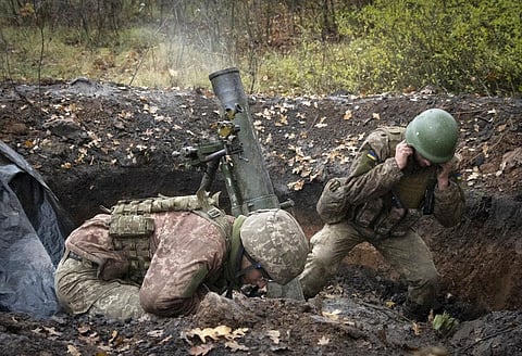 Ukrainian soldiers fire a mortar in the front line near Bakhmut, in the Donetsk region, Ukraine. (File Photo | AP)