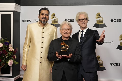 Ricky Kej, Herbert Waltl, and Stewart Copeland with the award for best immersive audio album for 'Divine Tides' at the 65th Grammy Awards (Photo | AP)
