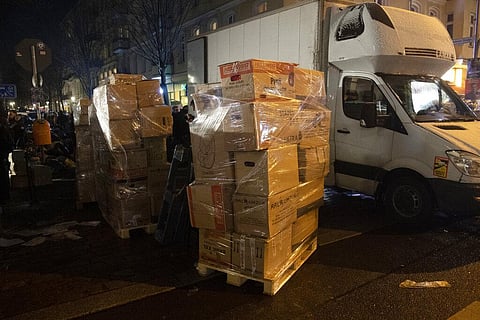 Relief supplies for earthquake victims in Turkey and Syria stand packed on Turmstrasse in Moabit, in Berlin, Germany, Monday, Feb. 6, 2023.